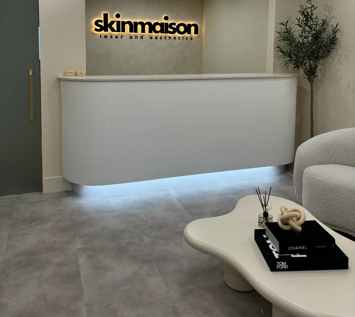 Clean, professional medical spa treatment room with neutral tones at Skinmaison Laser & Aesthetics in Newport Beach