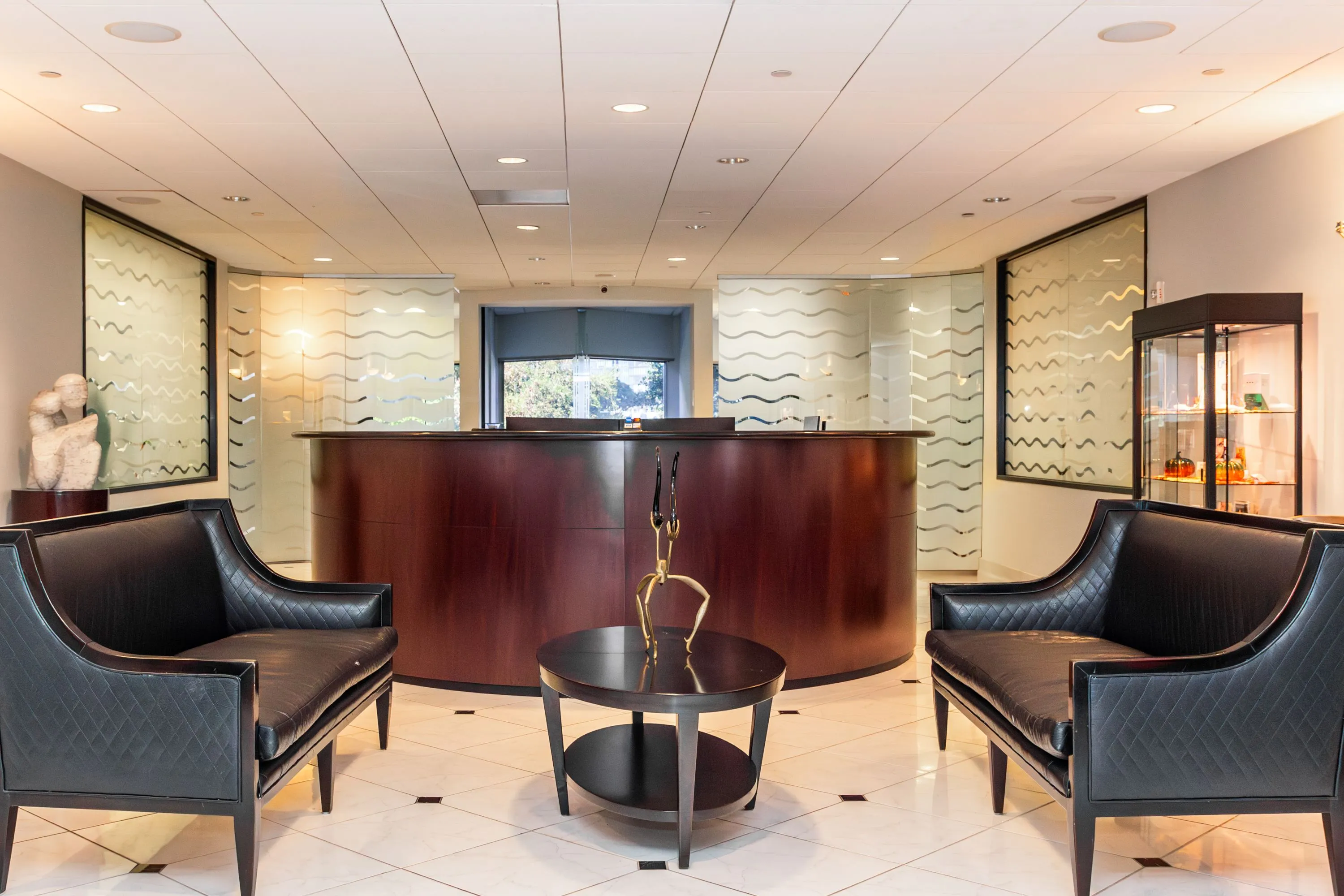 Clean, professional medical spa treatment room with neutral tones at J Todd Andrews, MD in Houston