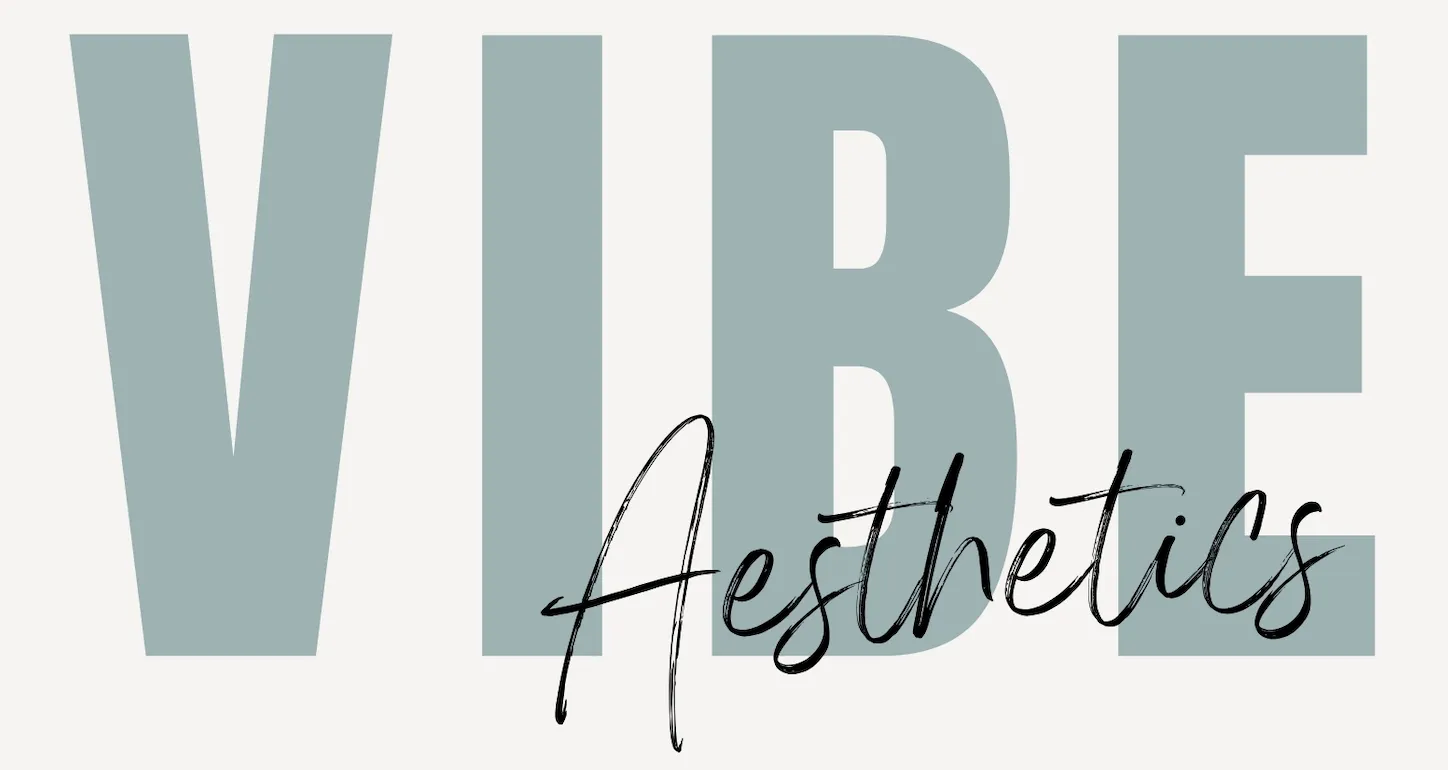 Clean, professional medical spa treatment room with neutral tones at Vibe Aesthetics in Marietta