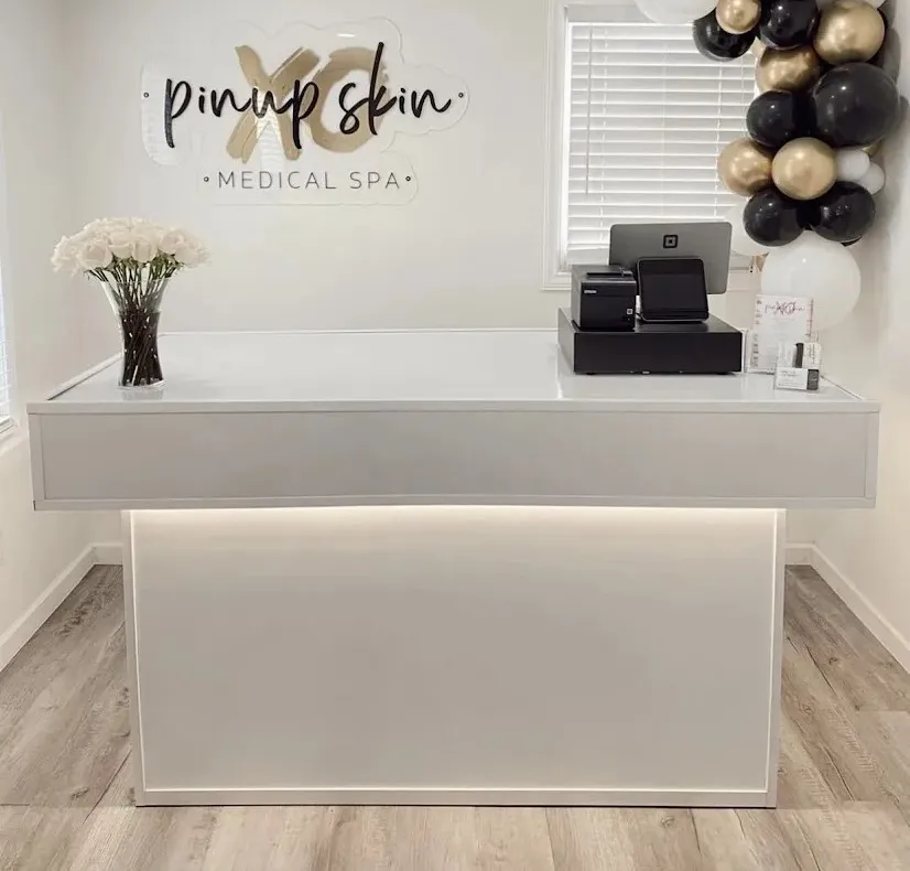 Clean, professional medical spa treatment room with neutral tones at Pinup skin spa in Franklin
