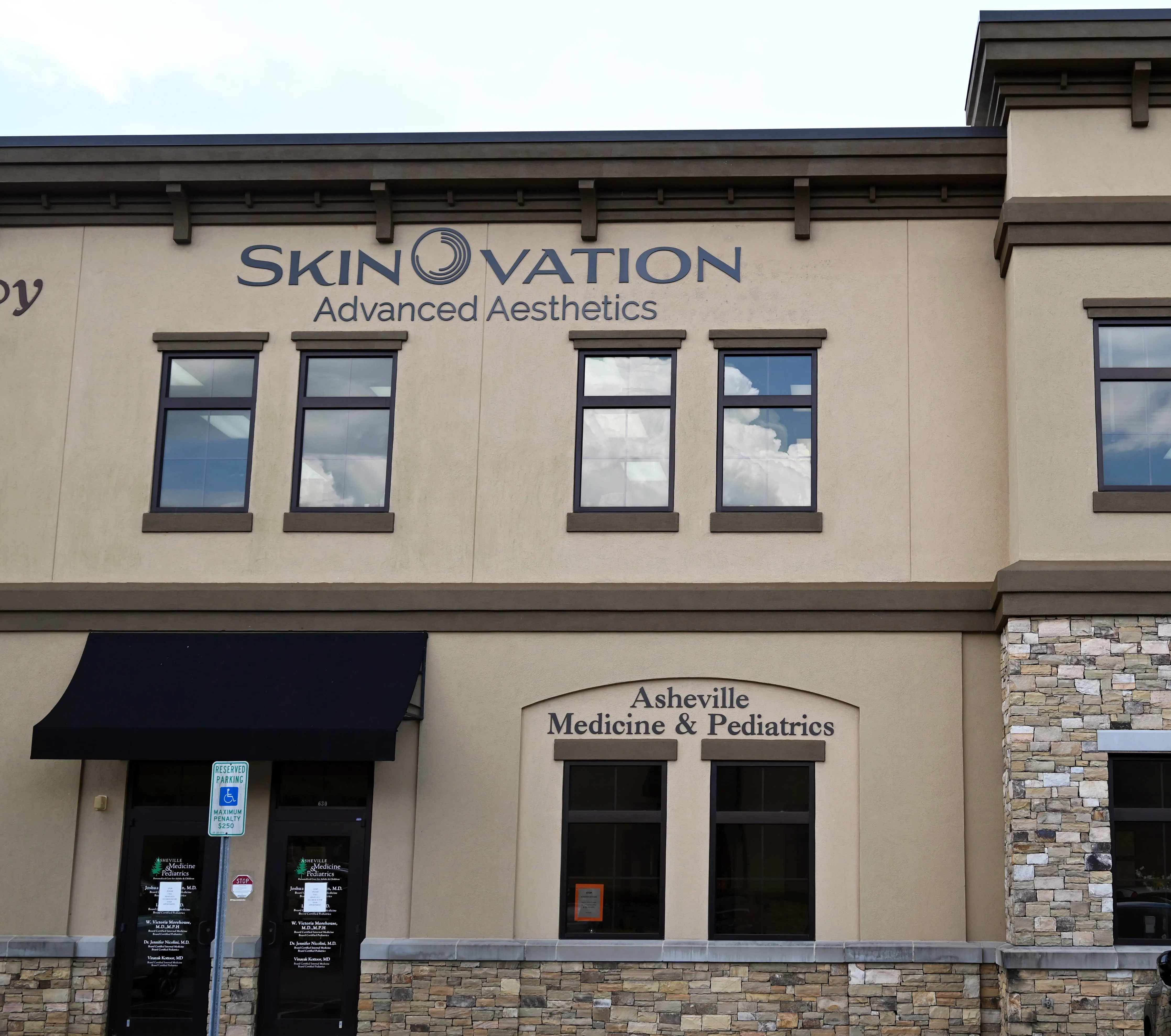 Clean, professional medical spa treatment room with neutral tones at SkinOvation Advanced Aesthetics in Arden