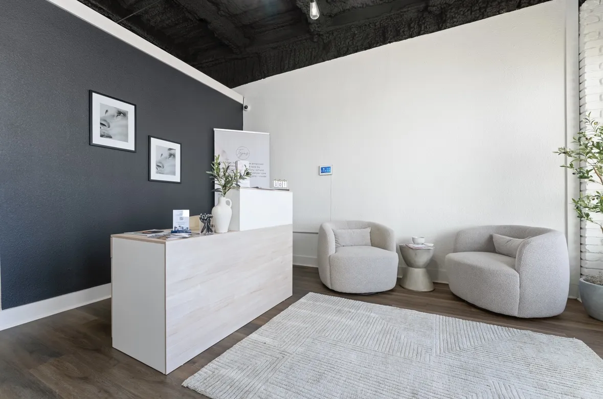 Clean, professional medical spa treatment room with neutral tones at Tejas Aesthetics in Waco