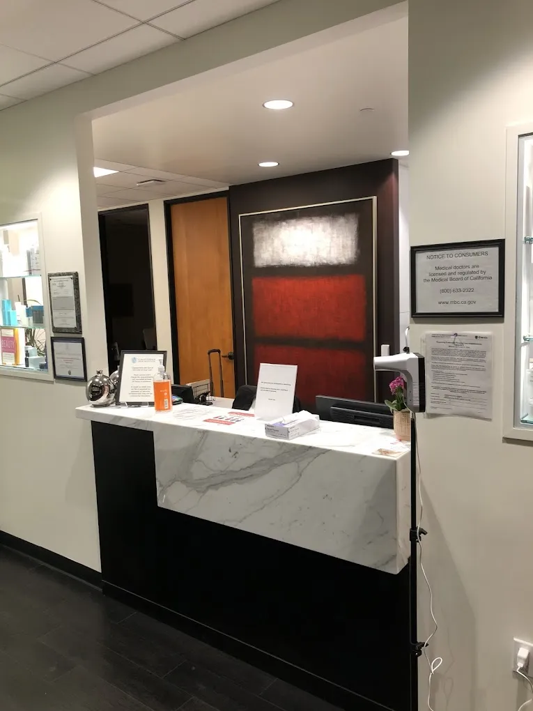 Clean, professional medical spa treatment room with neutral tones at John Roesler, MD in Calabasas