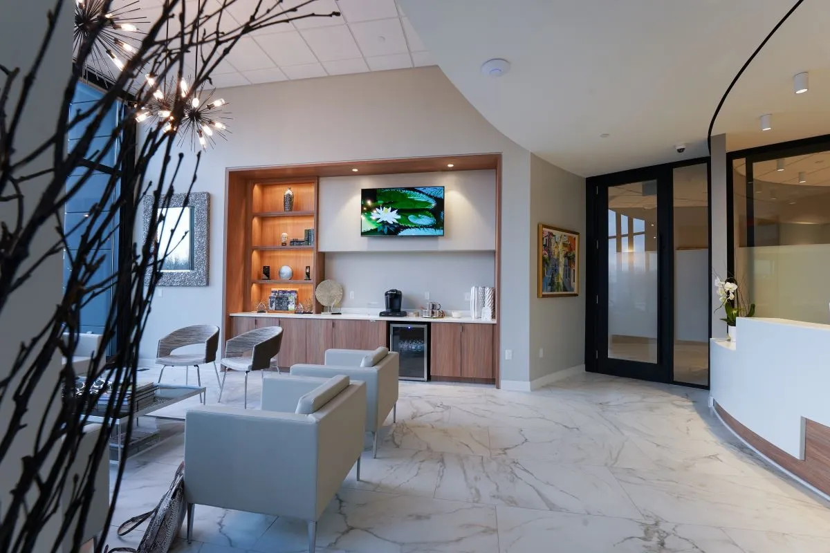 Clean, professional medical spa treatment room with neutral tones at Digenis Plastic Surgery Center and Med Spa in Louisville