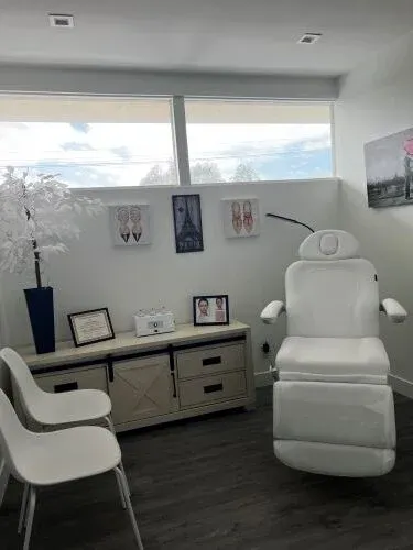 Clean, professional medical spa treatment room with neutral tones at Vein About You in Long Beach