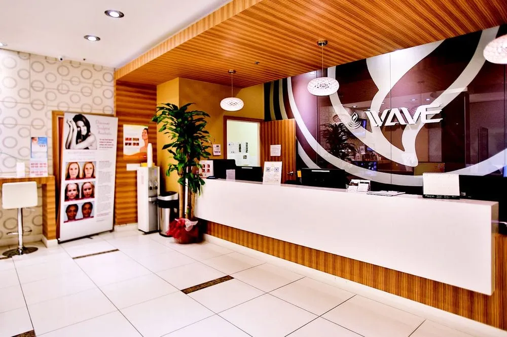 Clean, professional medical spa treatment room with neutral tones at Wave Plastic Surgery- LA in Los Angeles