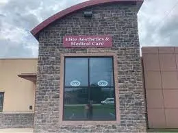 Clean, professional medical spa treatment room with neutral tones at Elite Aesthetics & Medical Care LLC in Chillicothe
