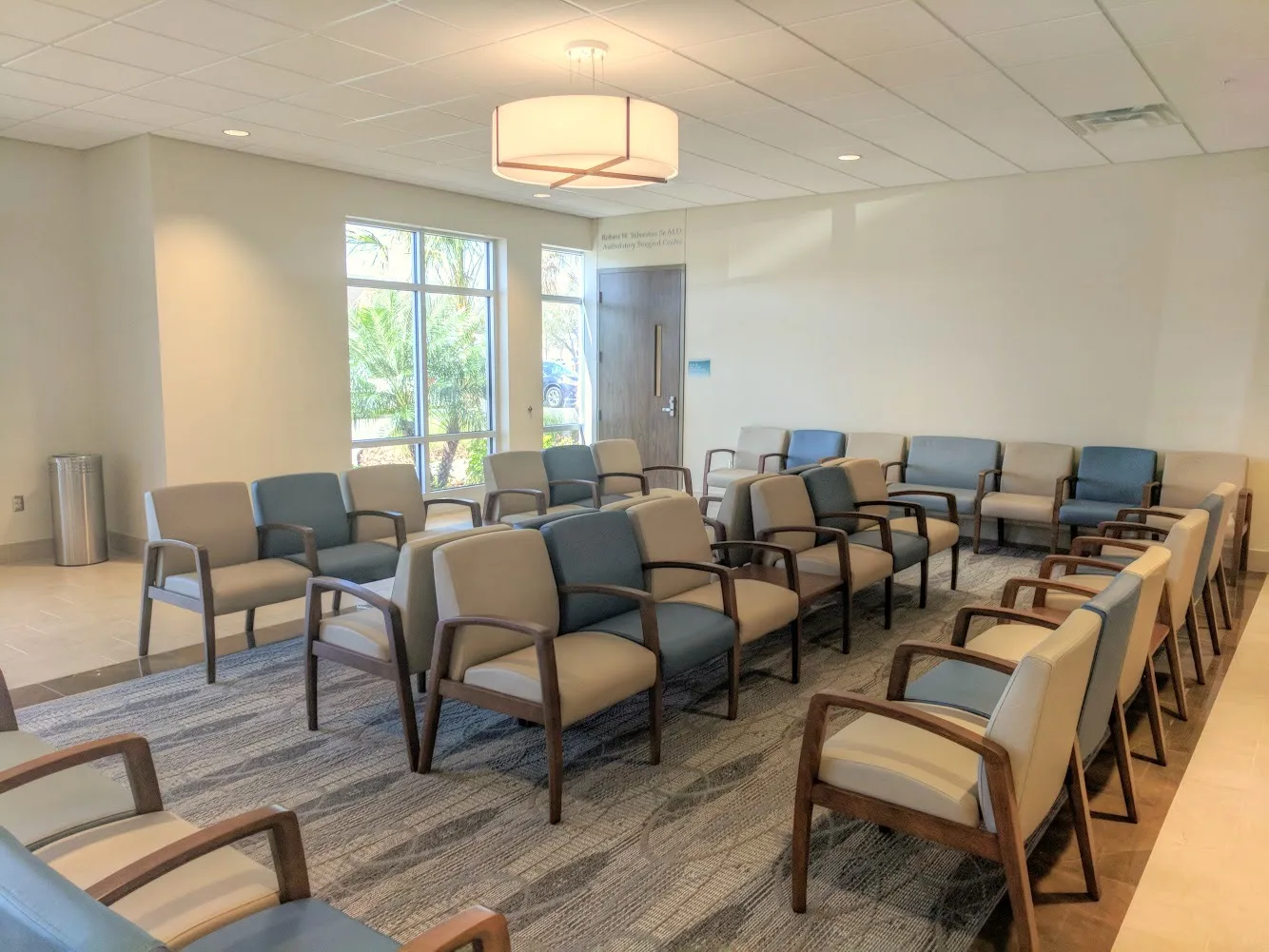 Clean, professional medical spa treatment room with neutral tones at Politis Plastic Surgery in Tampa