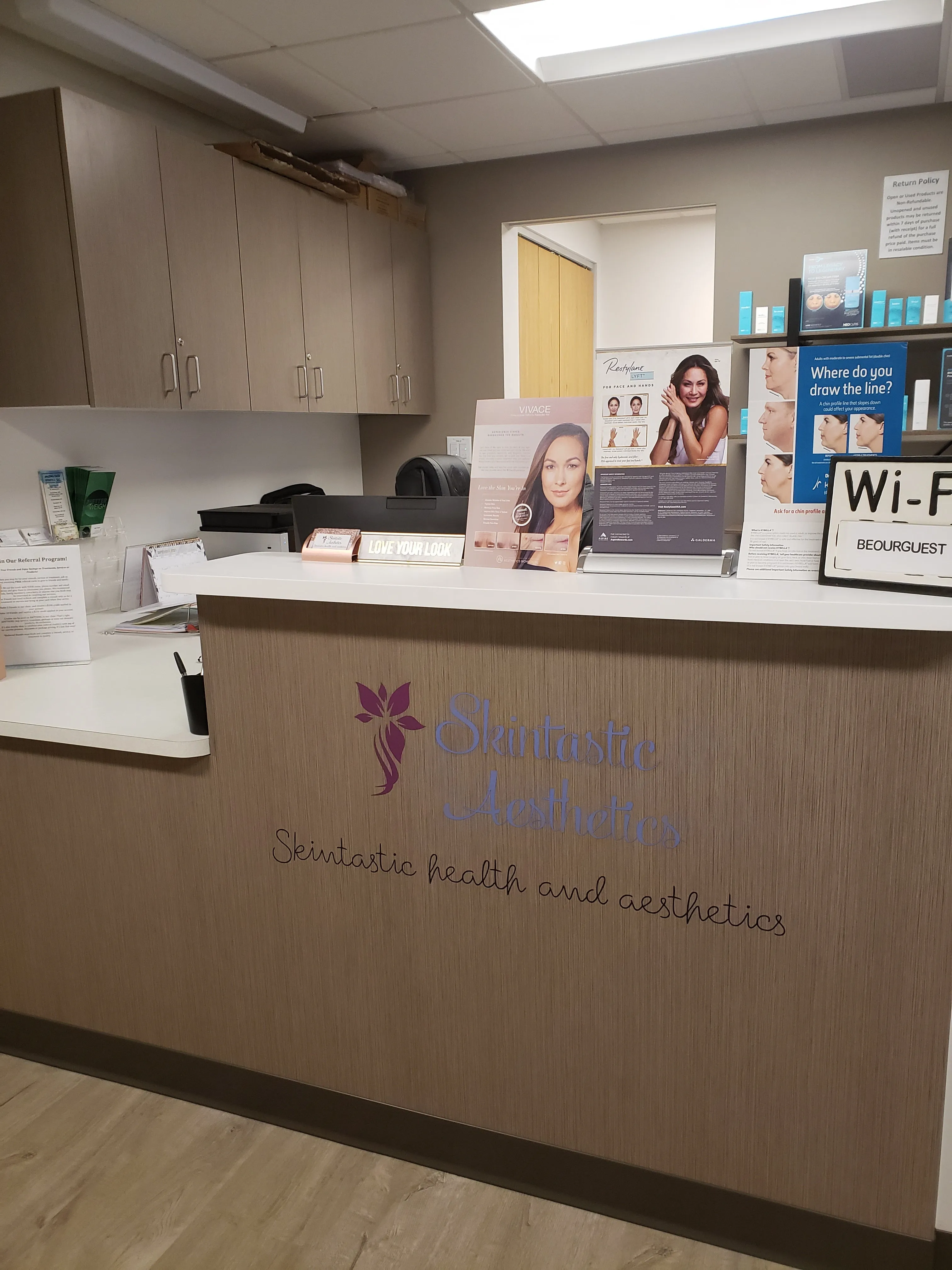 Clean, professional medical spa treatment room with neutral tones at Beauties and Beasts MedSpa in Littleton