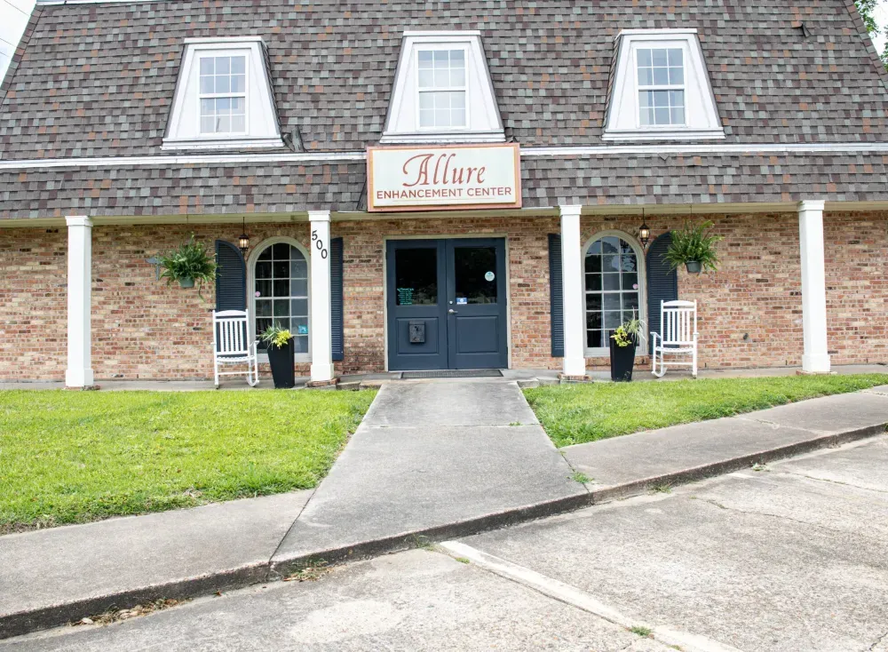 Clean, professional medical spa treatment room with neutral tones at Allure Enhancement Center in Lafayette