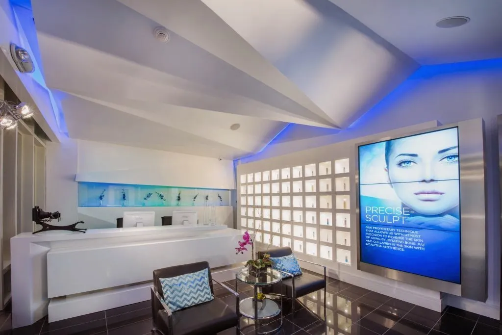 Clean, professional medical spa treatment room with neutral tones at Shino Bay Cosmetic Derm& Laser Inst in Fort Lauderdale