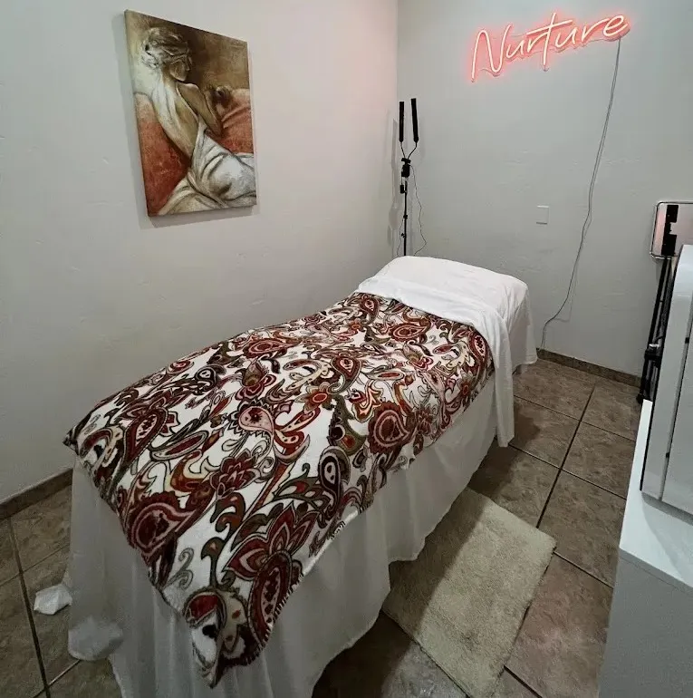 Clean, professional medical spa treatment room with neutral tones at Nurture Med Spa c/o Dawn Yellott in Tucson