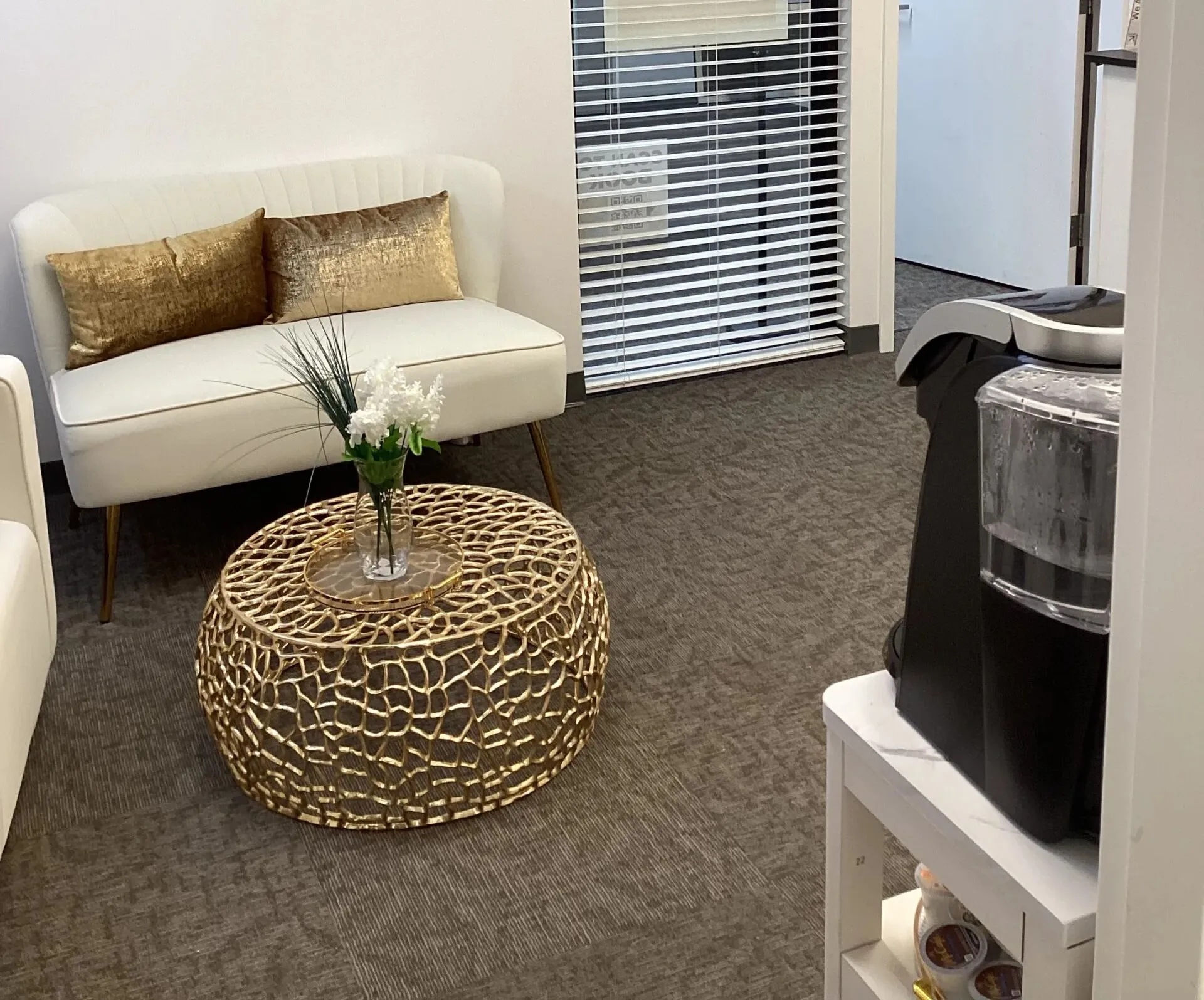 Clean, professional medical spa treatment room with neutral tones at OnCall Aesthetix & Wellness in Watsonville