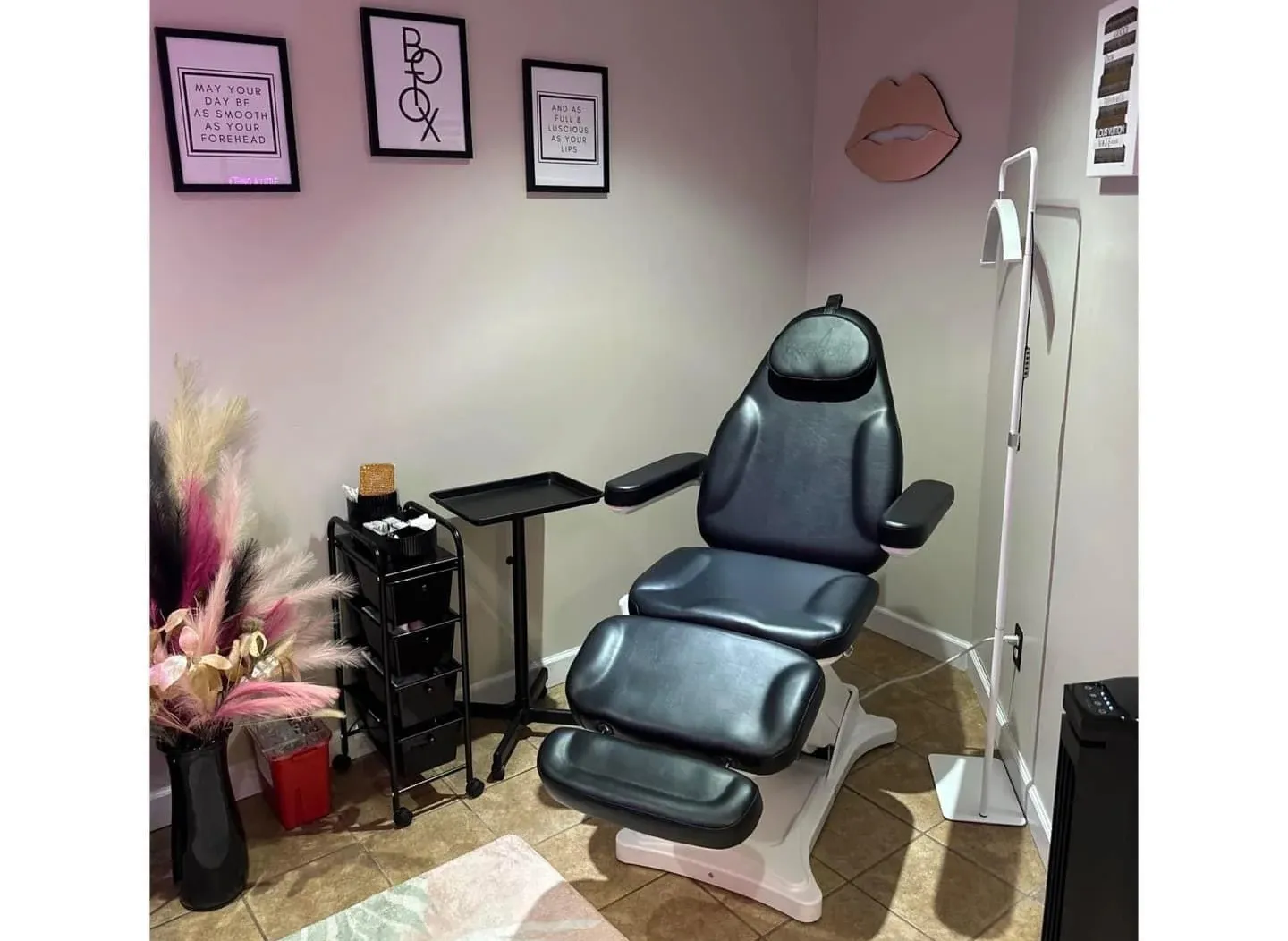 Clean, professional medical spa treatment room with neutral tones at Glamour Shots in Charleston