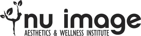 Clean, professional medical spa treatment room with neutral tones at Nu Image in Elgin