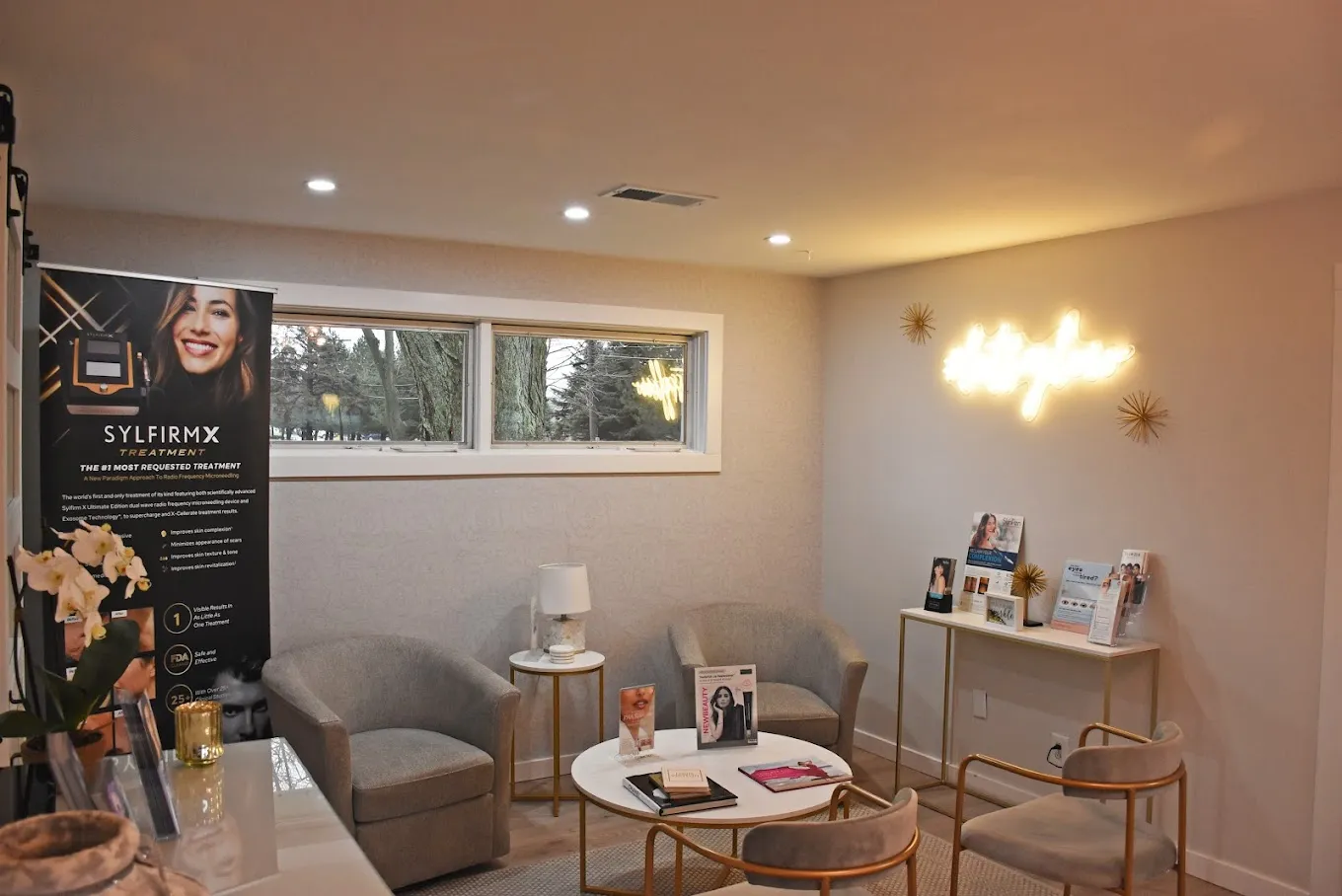 Clean, professional medical spa treatment room with neutral tones at GLOW with Britt in Rockford