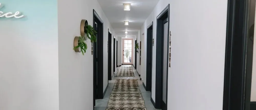 Clean, professional medical spa treatment room with neutral tones at PRFCT in La Jolla