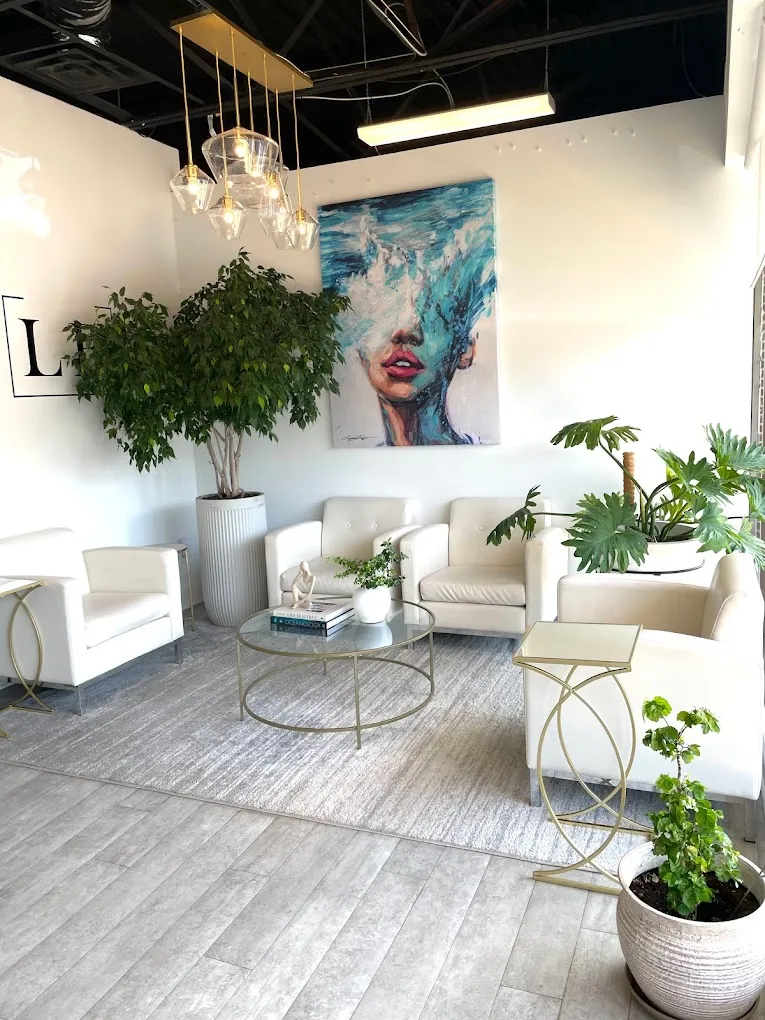 Clean, professional medical spa treatment room with neutral tones at Christine Poharatnyj NP in East Aurora