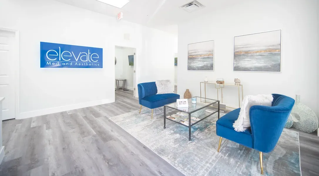 Clean, professional medical spa treatment room with neutral tones at Elevate Med and Aesthetics in Plantation