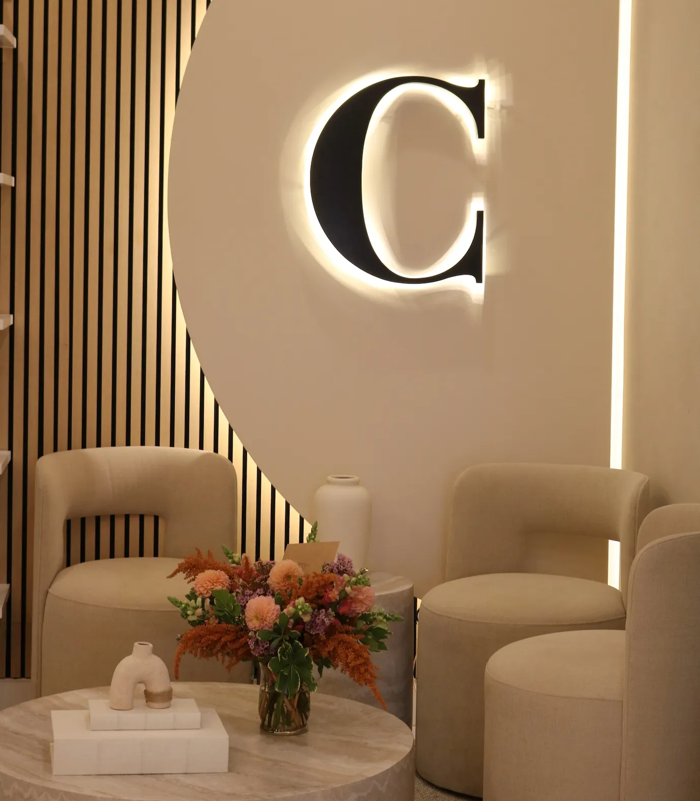 Clean, professional medical spa treatment room with neutral tones at Coastal Wellness MD in Corona Del Mar