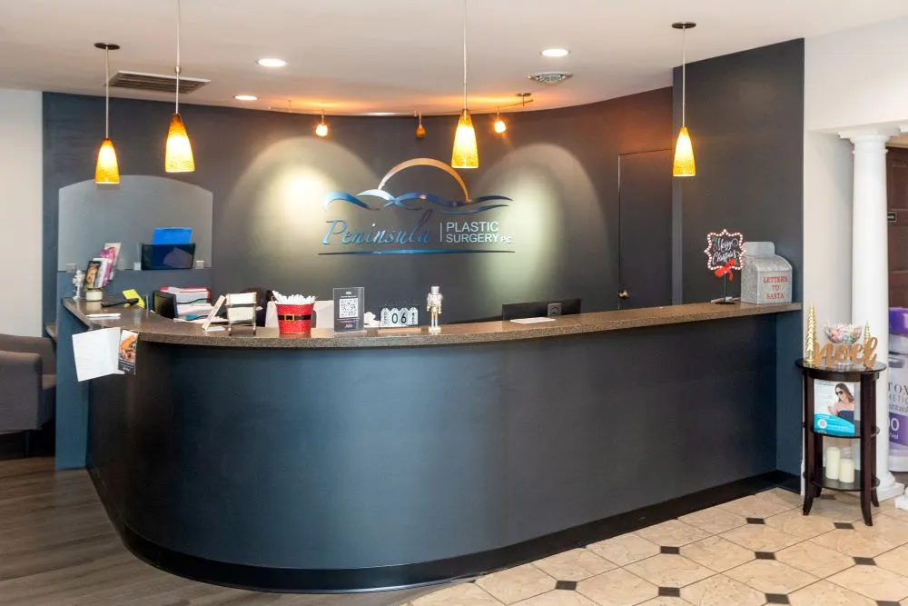 Clean, professional medical spa treatment room with neutral tones at Peninsula Plastic Surgery in Salisbury