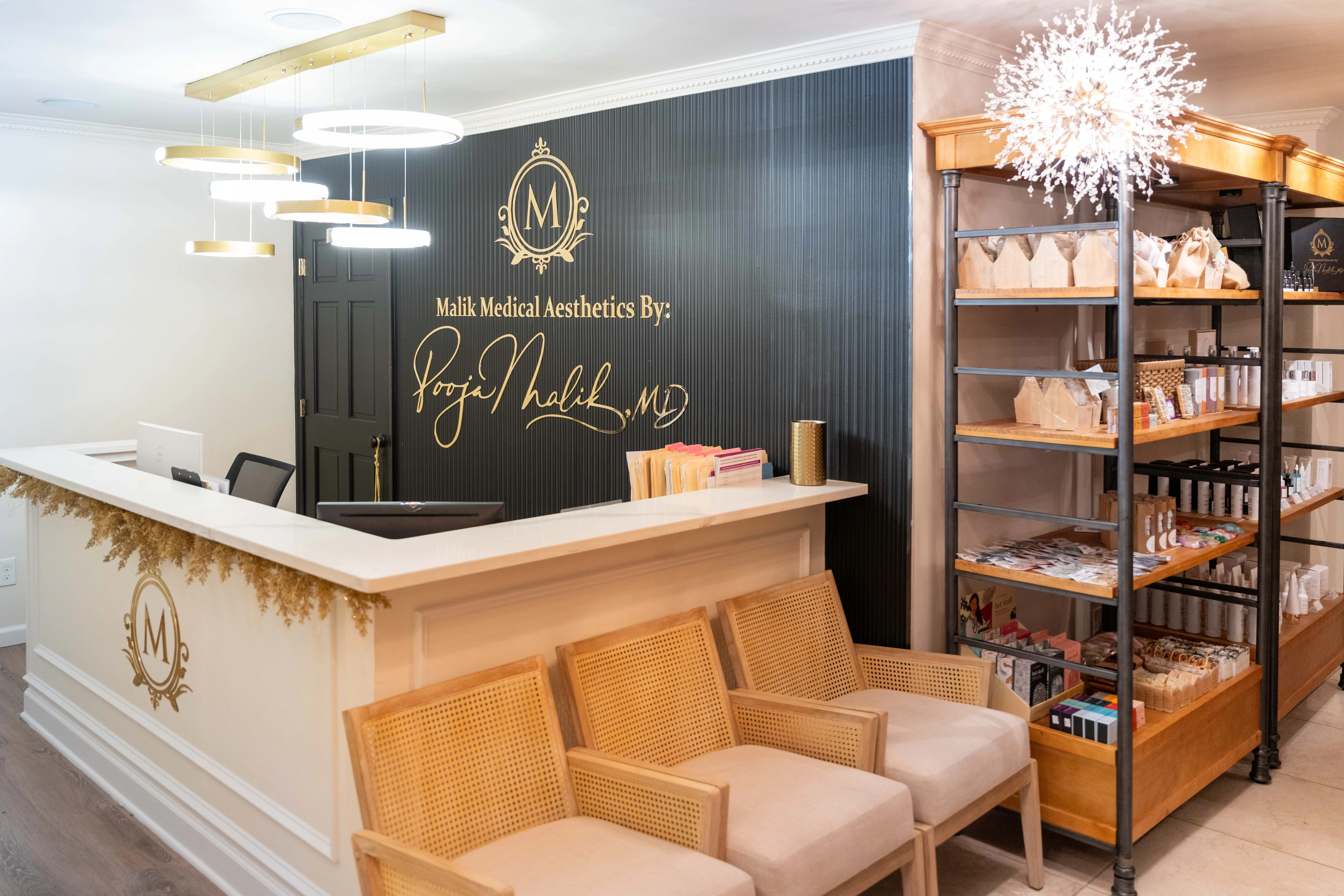 Clean, professional medical spa treatment room with neutral tones at Malik Medical Aesthetics in Mullica Hill