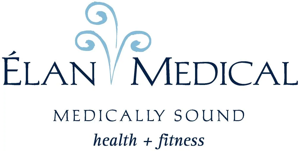 Clean, professional medical spa treatment room with neutral tones at Elan Medical in Fairfield