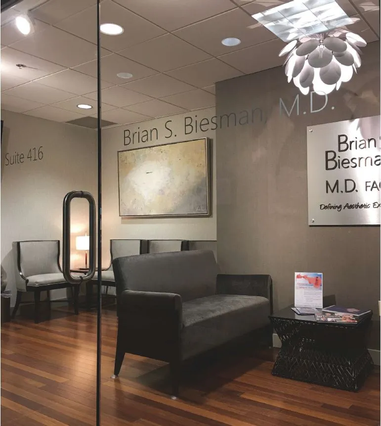 Clean, professional medical spa treatment room with neutral tones at Brian Biesman MD in Nashville