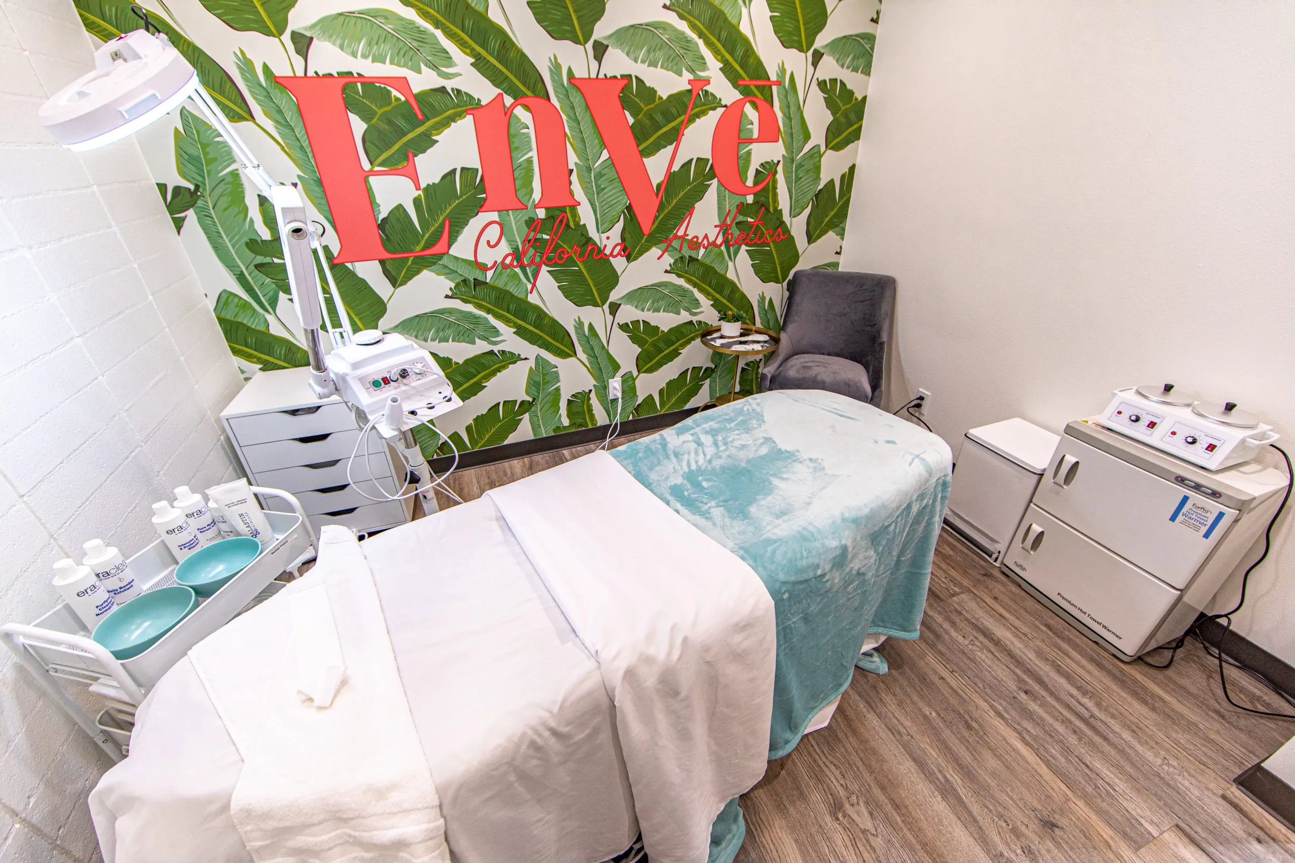 Clean, professional medical spa treatment room with neutral tones at Enve California Aesthetics - Tustin in Tustin