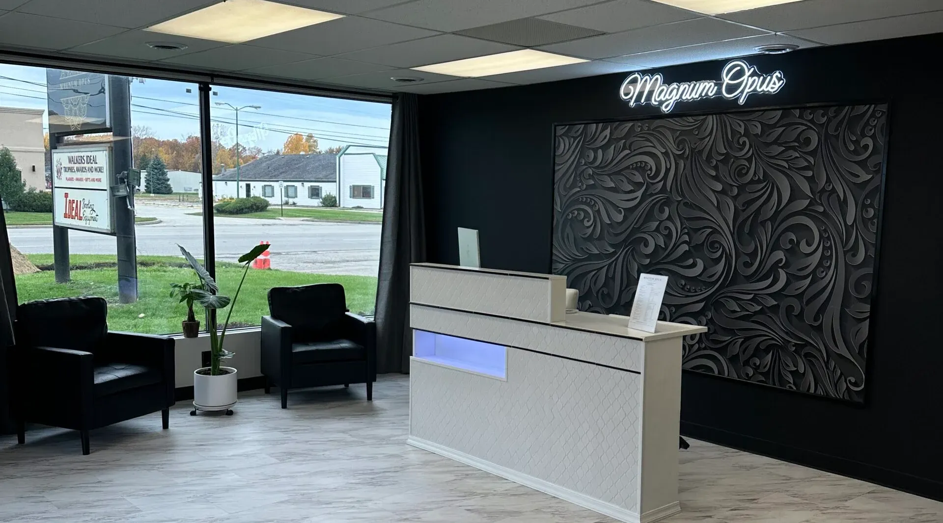Clean, professional medical spa treatment room with neutral tones at Magnum Opus Medical Spa Mgmt Co. in Saginaw