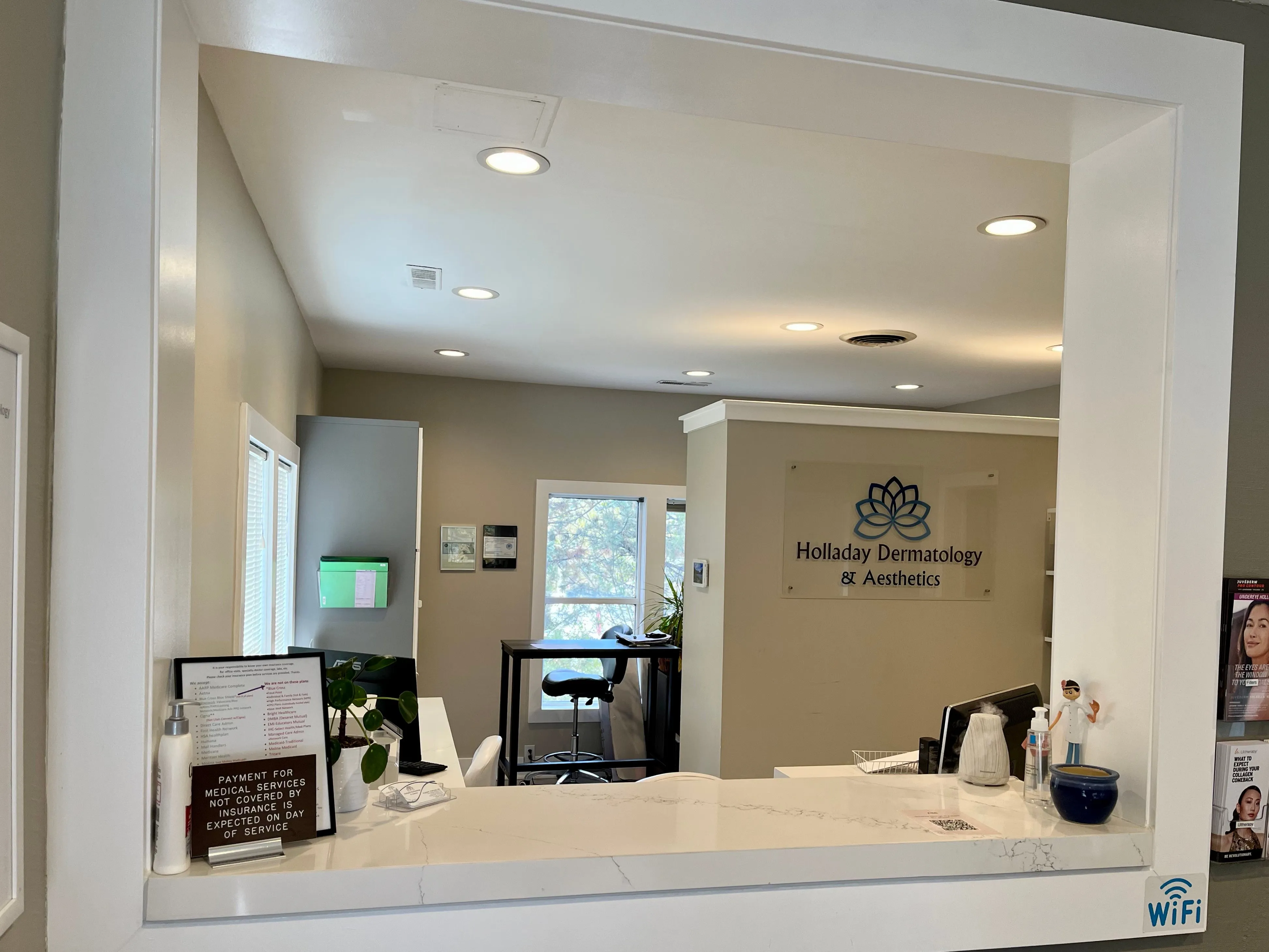 Clean, professional medical spa treatment room with neutral tones at Holladay Dermatology and Aesthetics in Holladay