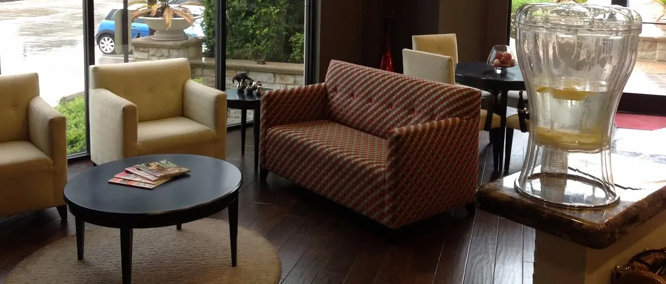 Clean, professional medical spa treatment room with neutral tones at National Laser Institute- Dallas in Dallas