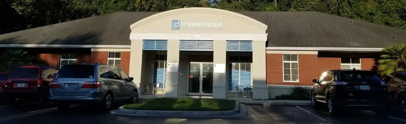 Clean, professional medical spa treatment room with neutral tones at Gainesville Dermatology in Gainesville