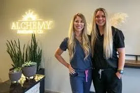Clean, professional medical spa treatment room with neutral tones at Alchemy Aesthetics Co. in New Braunfels
