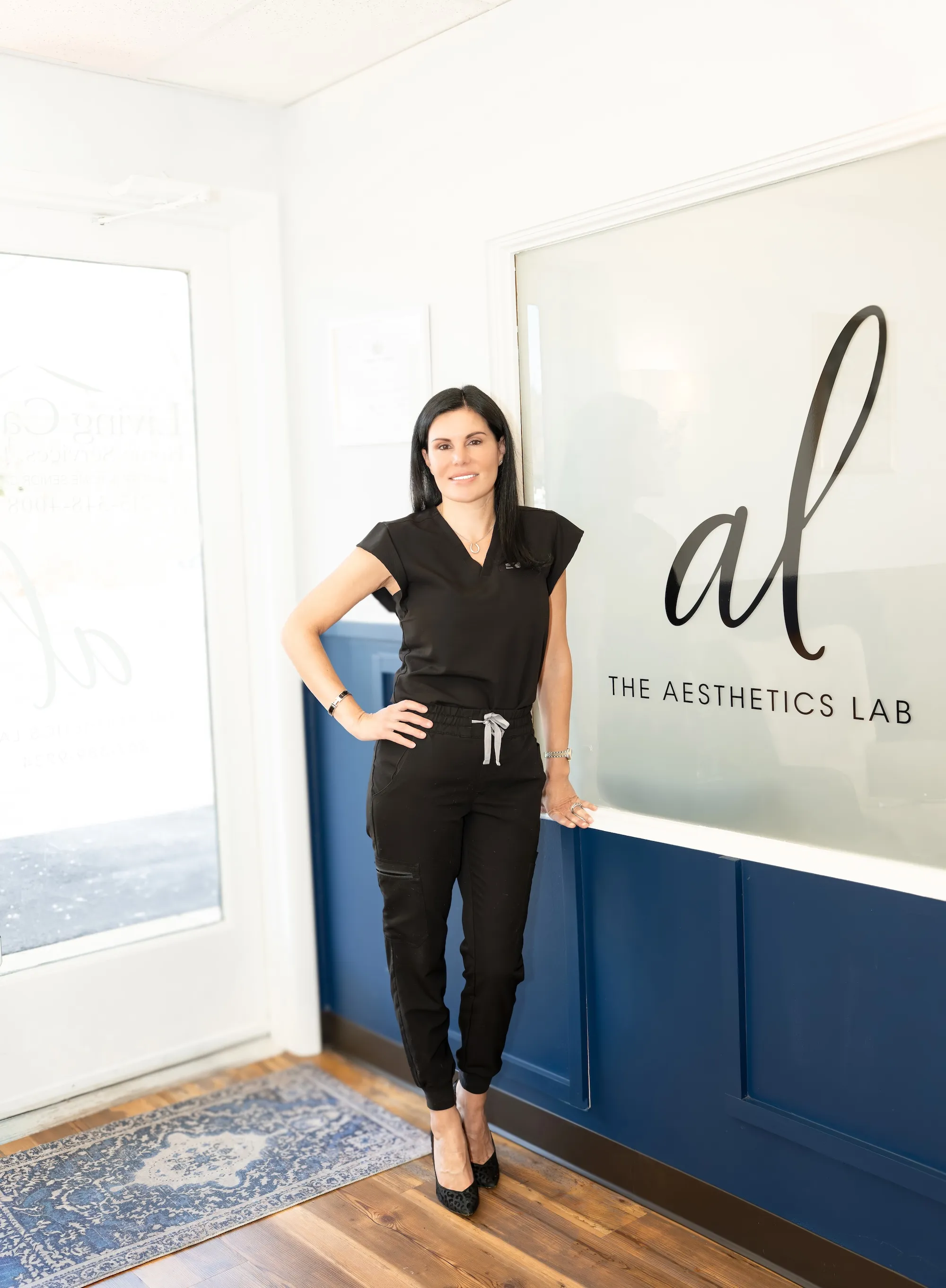 Clean, professional medical spa treatment room with neutral tones at The Aesthetics Lab in Doylestown