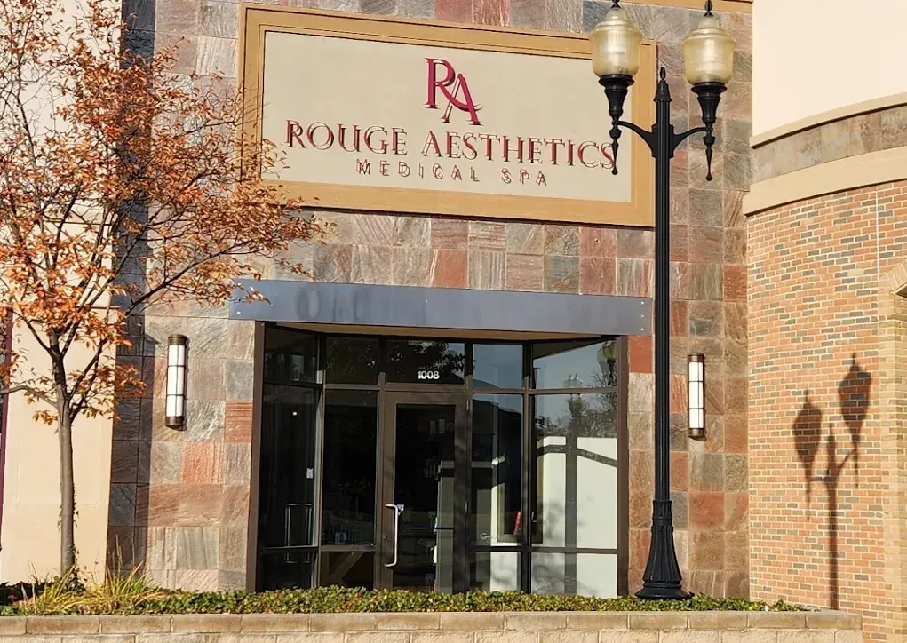 Clean, professional medical spa treatment room with neutral tones at Rouge Aesthetics Granger in Granger