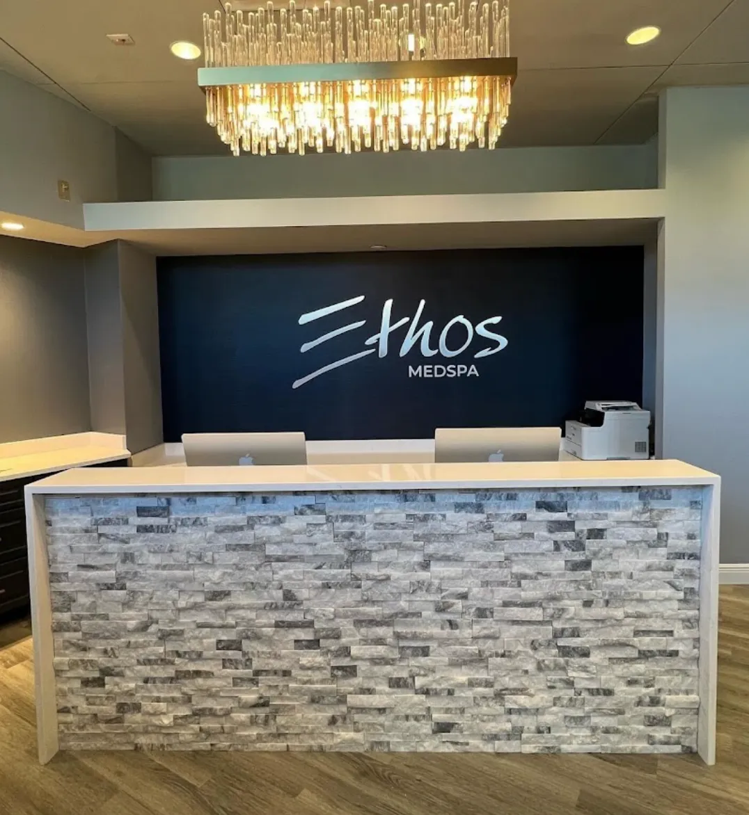 Clean, professional medical spa treatment room with neutral tones at Ethos Medical Spa in Chesterfield