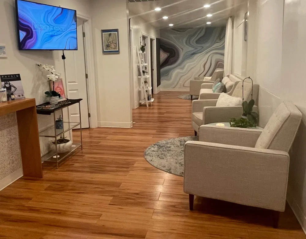 Clean, professional medical spa treatment room with neutral tones at Mundi Attinasi MD in Long Beach