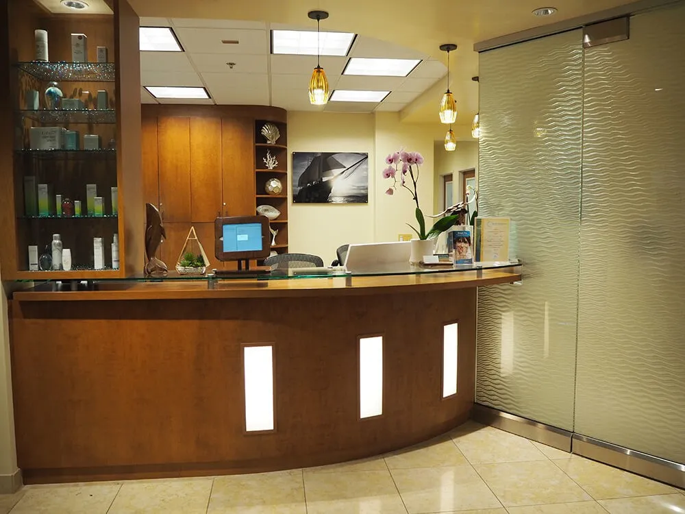 Clean, professional medical spa treatment room with neutral tones at Amanda Lloyd MD in Encinitas