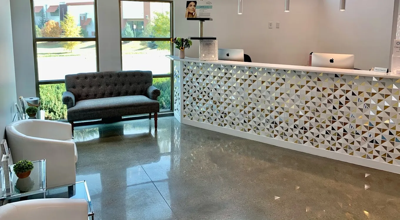 Clean, professional medical spa treatment room with neutral tones at Harmony Skin and Wellness in Fort Collins