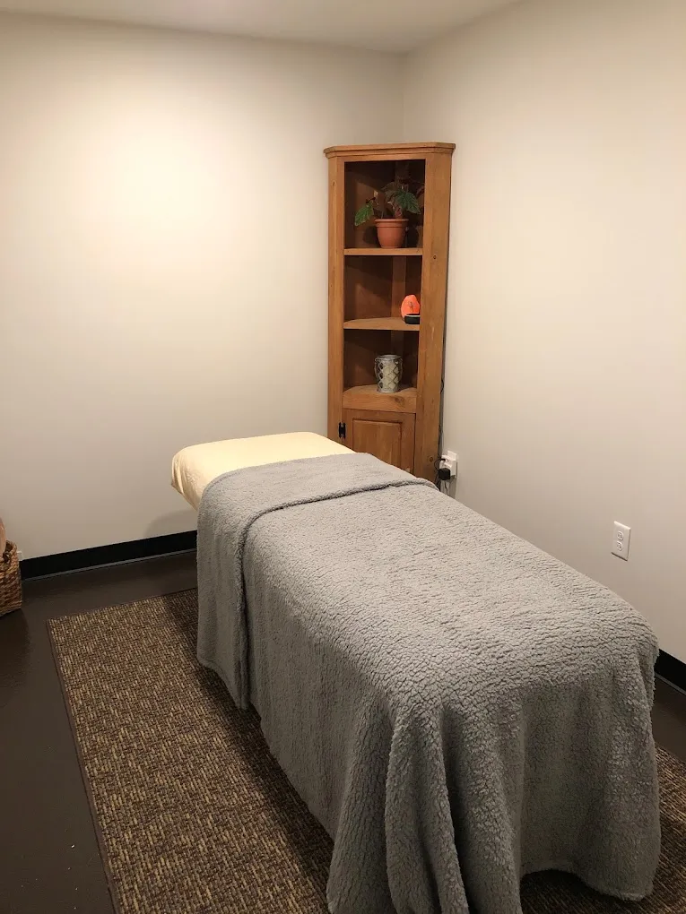 Clean, professional medical spa treatment room with neutral tones at Mountain Miracles Med Spa in Rangeley