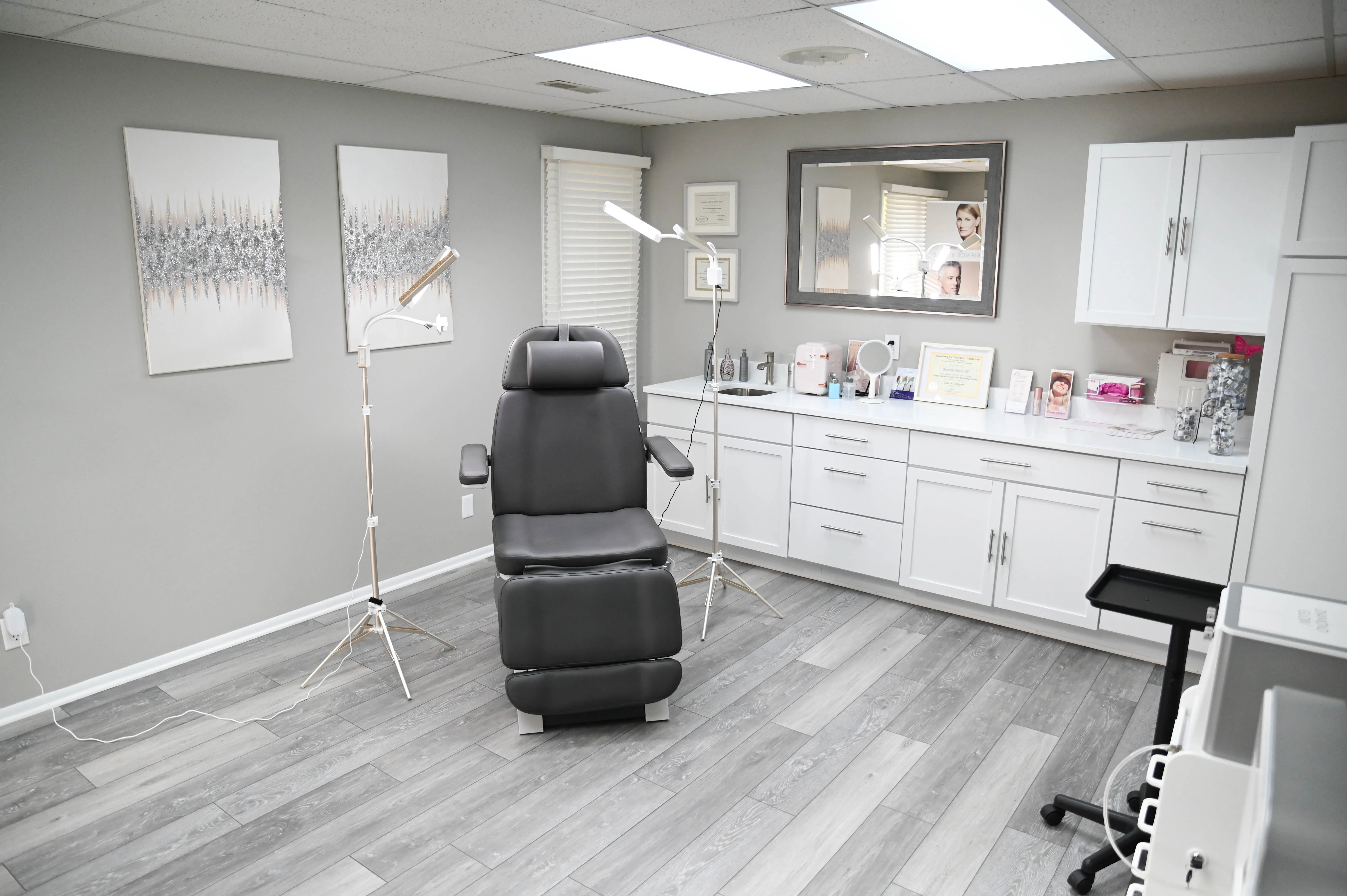 Clean, professional medical spa treatment room with neutral tones at Radiance by Roxanne in Roscoe